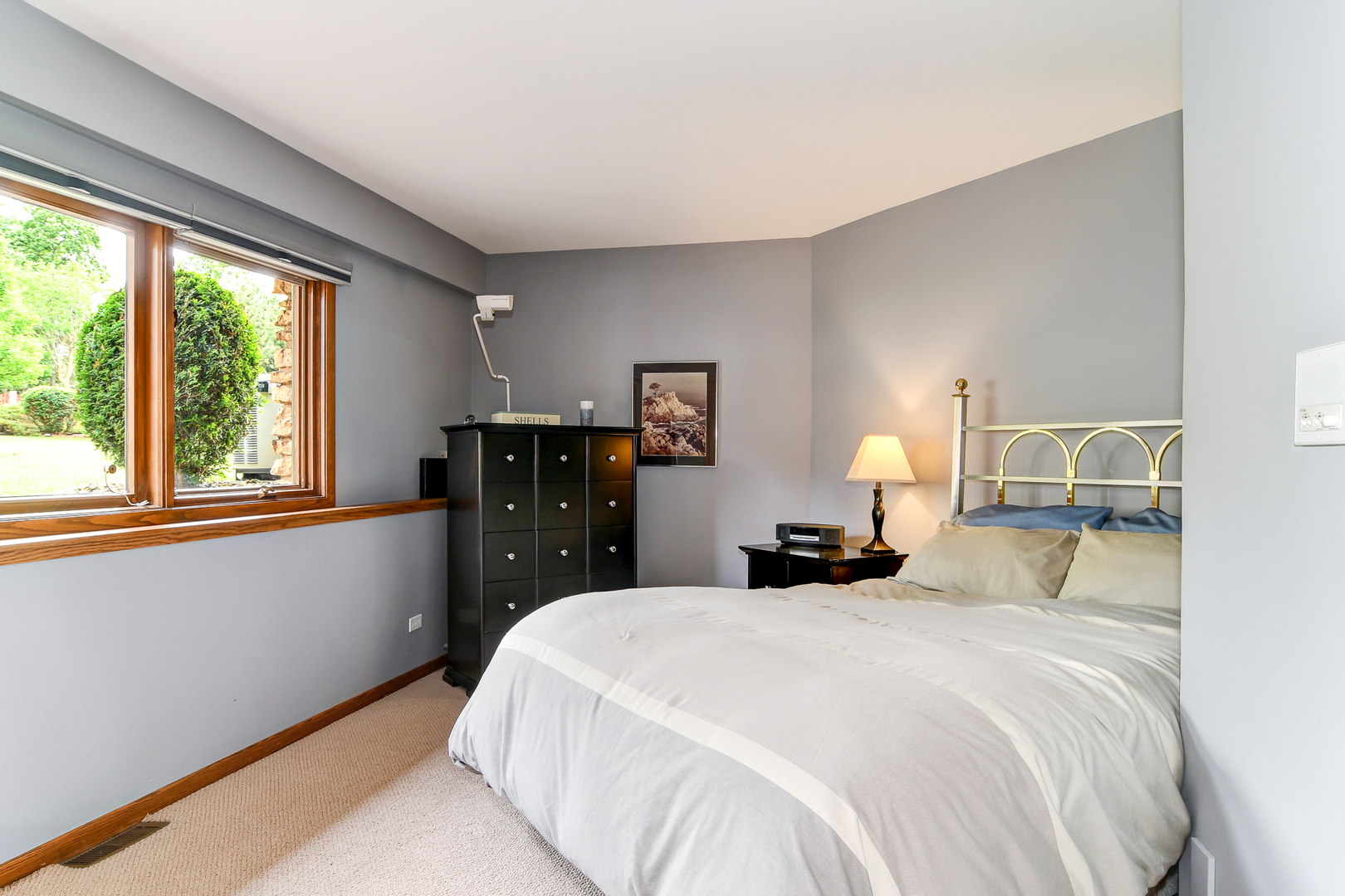 39 Fawn Court Burr Ridge, IL 60527 - Photo 32 of 46 a bedroom with a bed and window