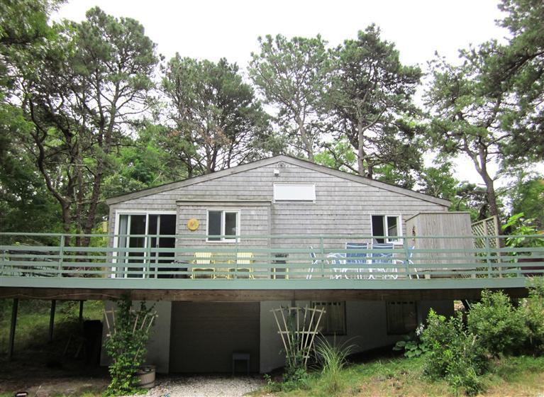 151 Cove View Road Wellfleet, MA 02667 - Photo 3 of 32 a view of a house with a backyard