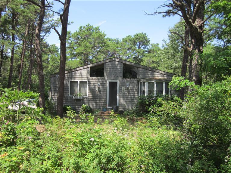 151 Cove View Road Wellfleet, MA 02667 - Photo 31 of 32 front view of a house with a yard