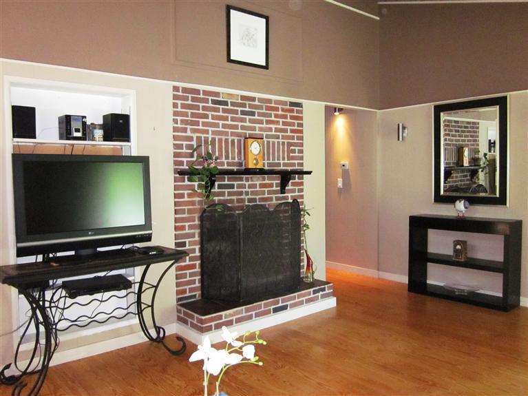 151 Cove View Road Wellfleet, MA 02667 - Photo 6 of 32 a living room with furniture and a flat screen tv