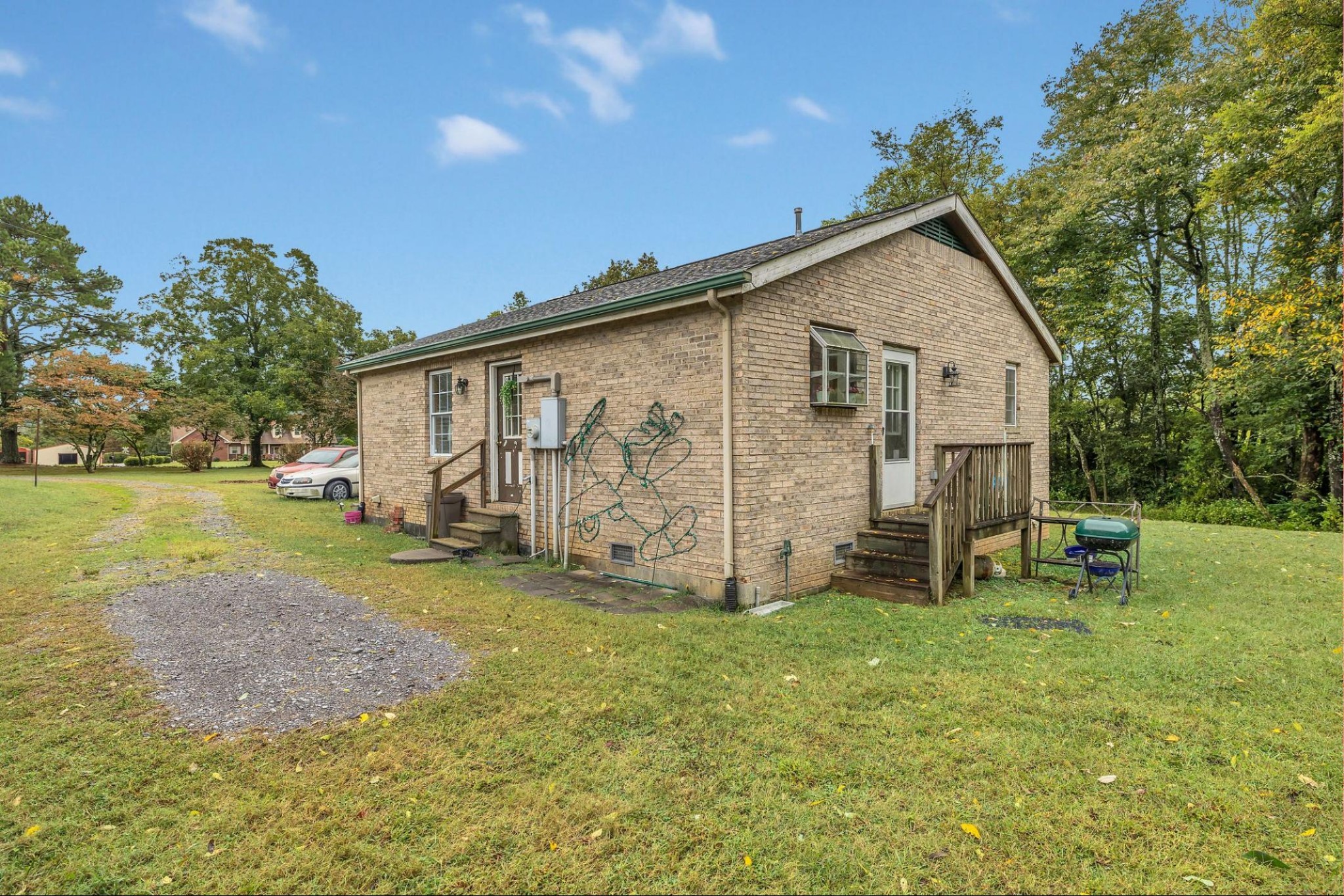 6845 Bizzell Howell Road College Grove, TN 37046 - Photo 19 of 20 a view of a house with backyard