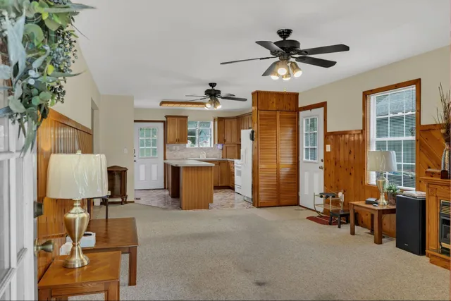 a view of a kitchen with appliances and a window