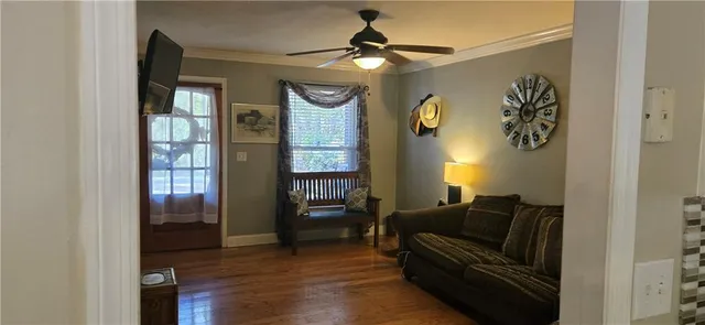 a living room with furniture and a window