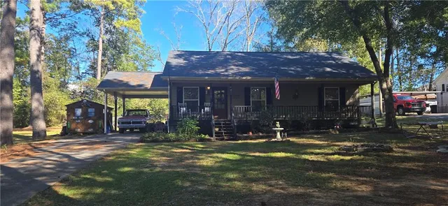 a view of swimming pool with a yard