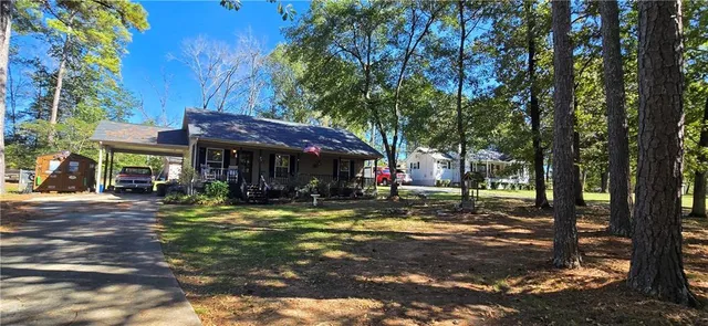 a view of a town with large trees
