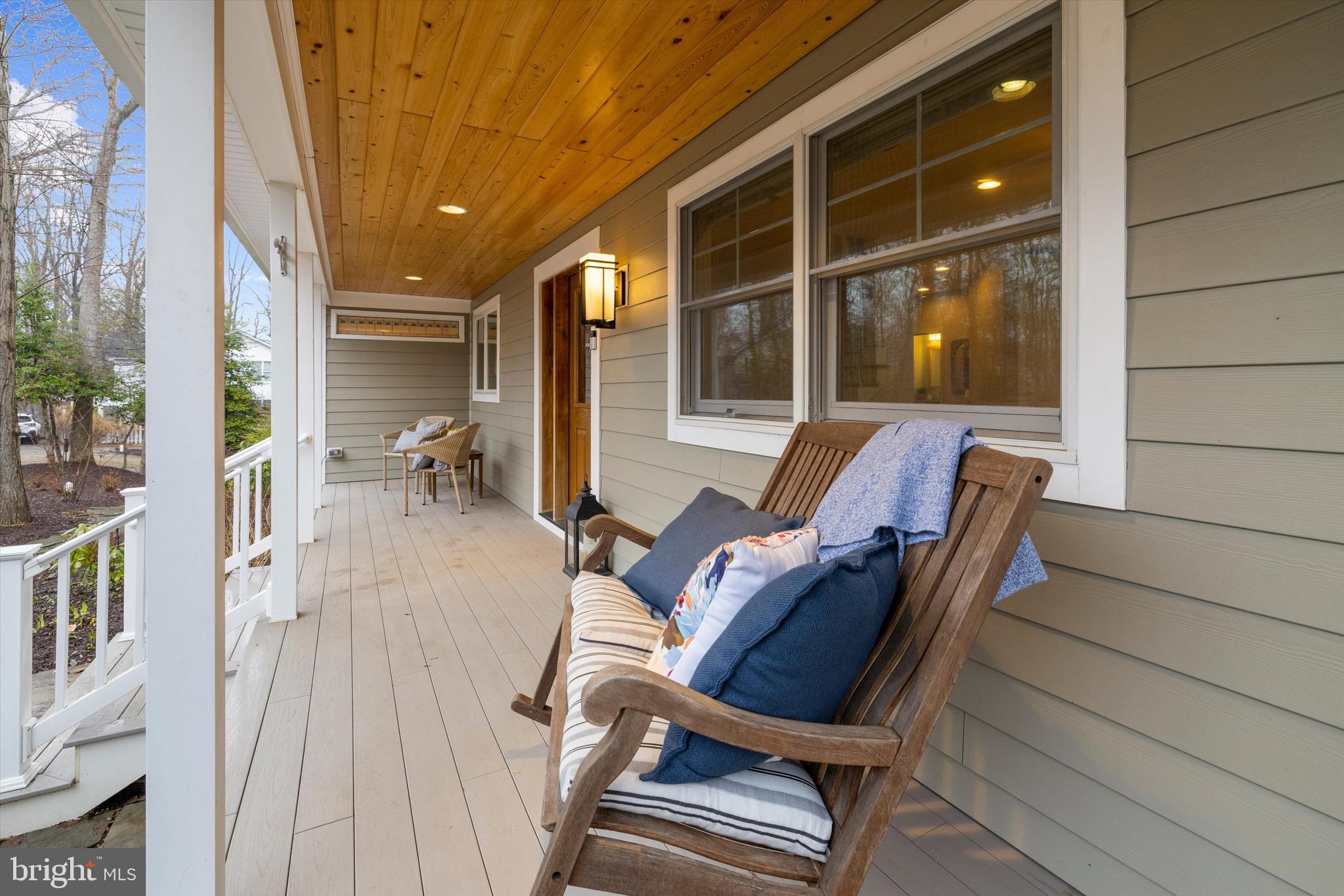 2321 Hickory Road Annapolis, MD 21401 - Photo 54 of 65 a view of a patio with table and chairs and wooden floor