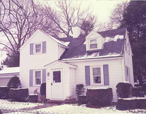 73 Margaret Road Newton, MA 02461 - Photo 1 of 1 a front view of a house with a yard