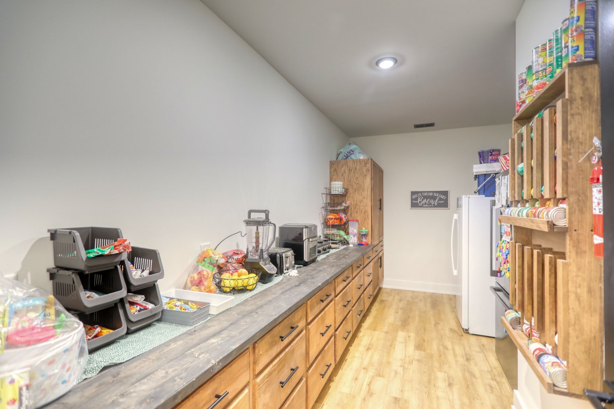 290 Dink Rut Road Portland, TN 37148 - Photo 13 of 56 a room with storage and utility