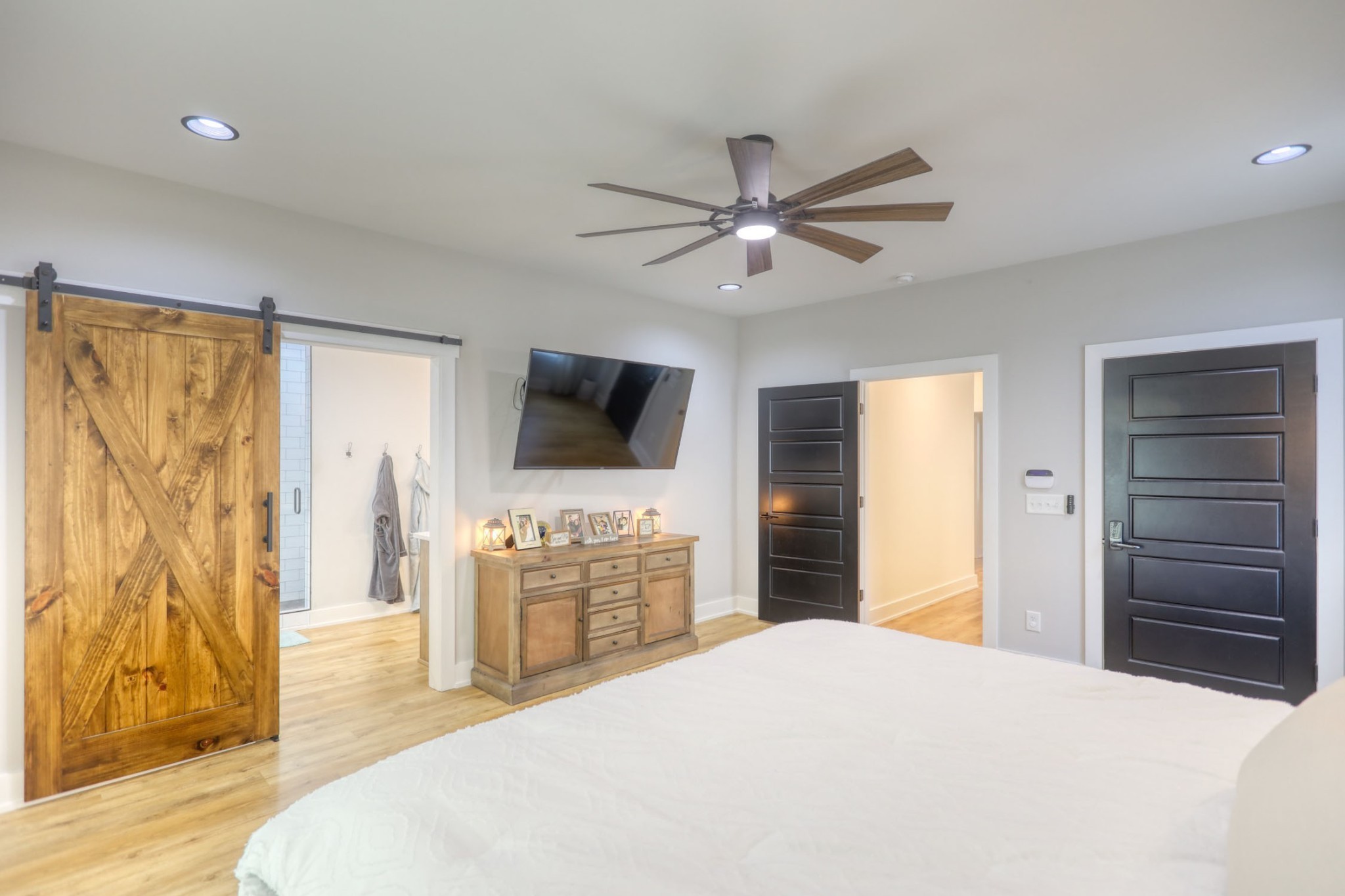 290 Dink Rut Road Portland, TN 37148 - Photo 22 of 56 a bedroom with a bed and a flat screen tv