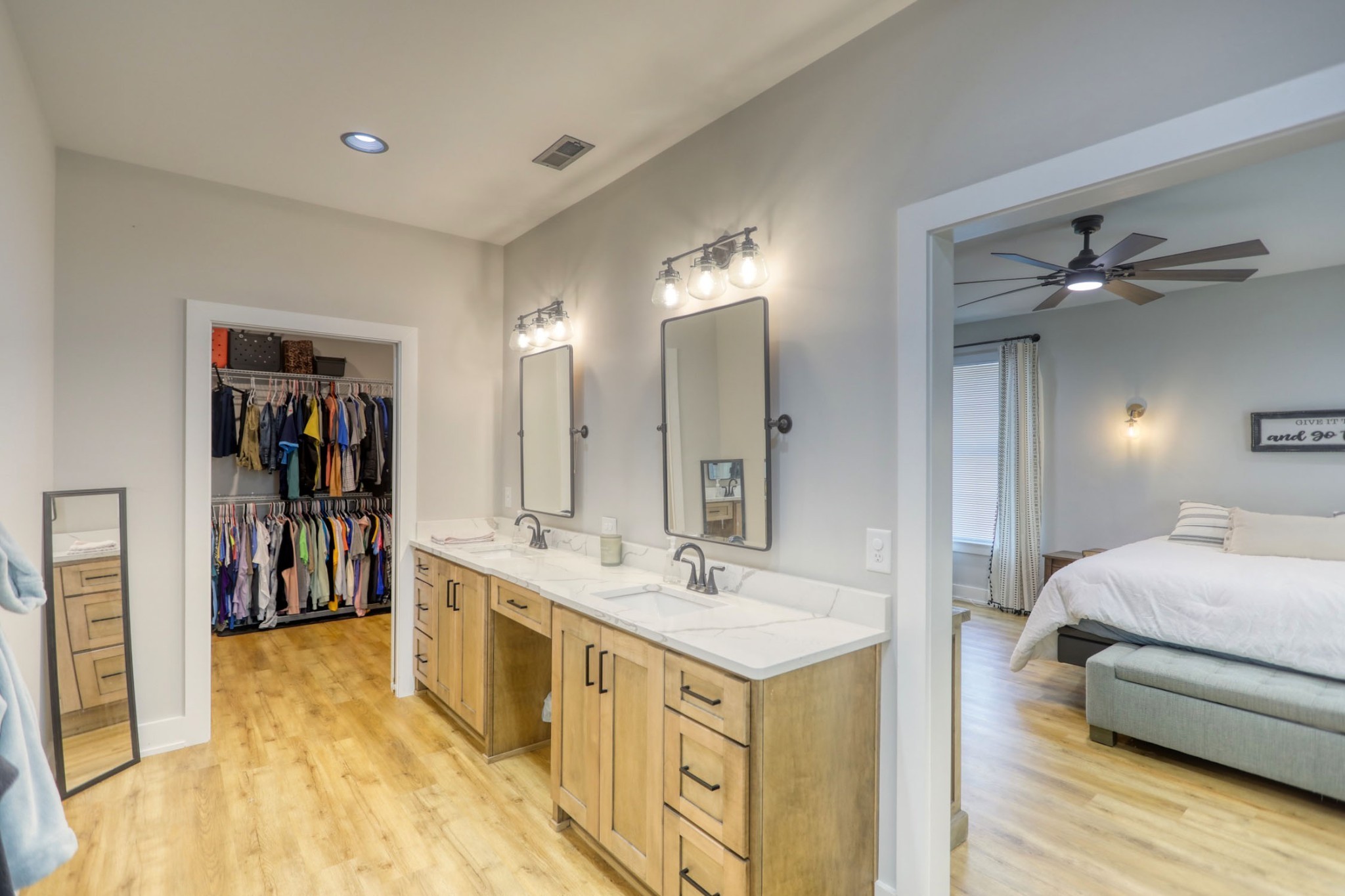 290 Dink Rut Road Portland, TN 37148 - Photo 23 of 56 a spacious bathroom with a double vanity sink and a mirror