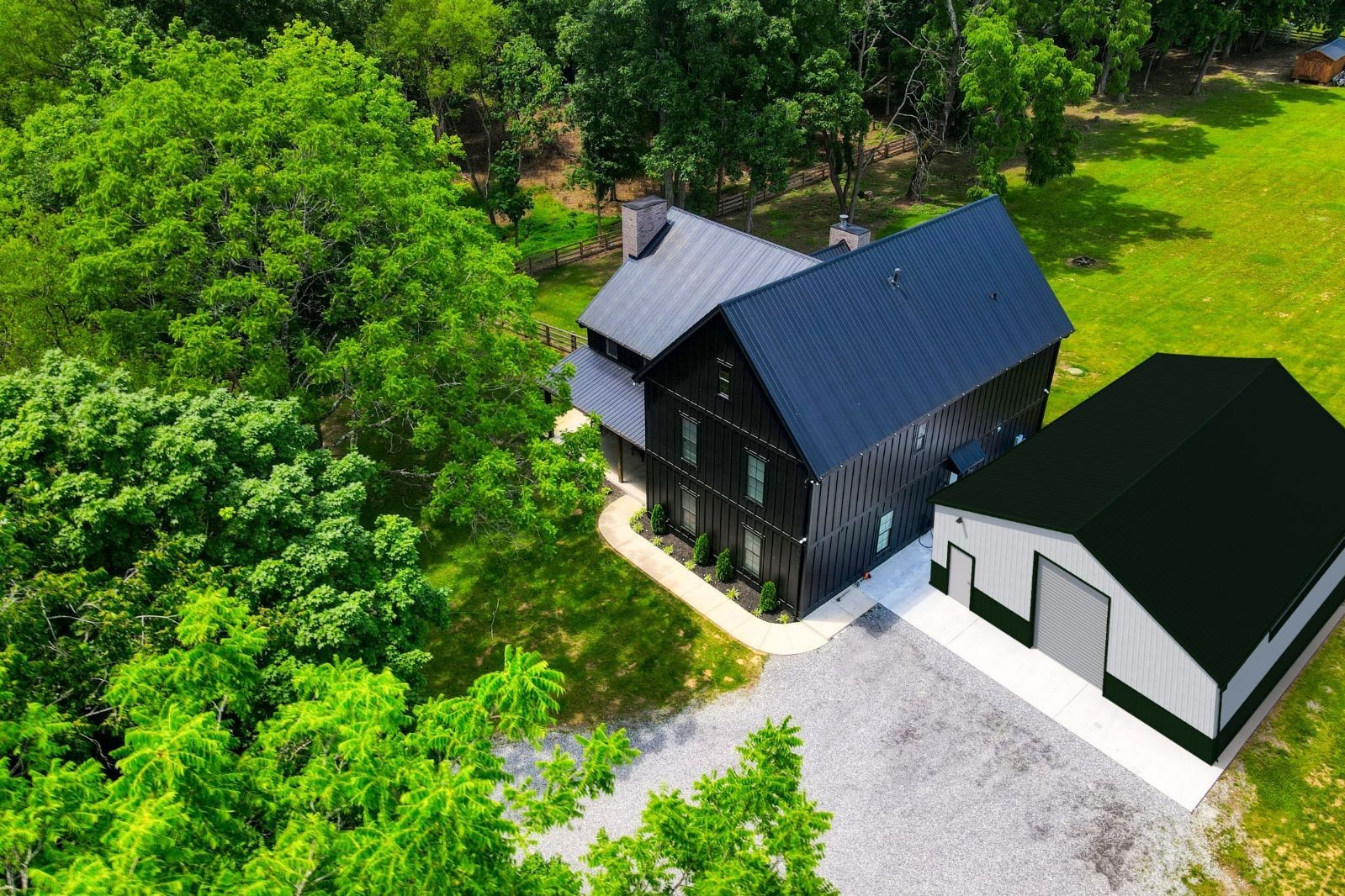 290 Dink Rut Road Portland, TN 37148 - Photo 3 of 56 a view of house with yard and trees in the background