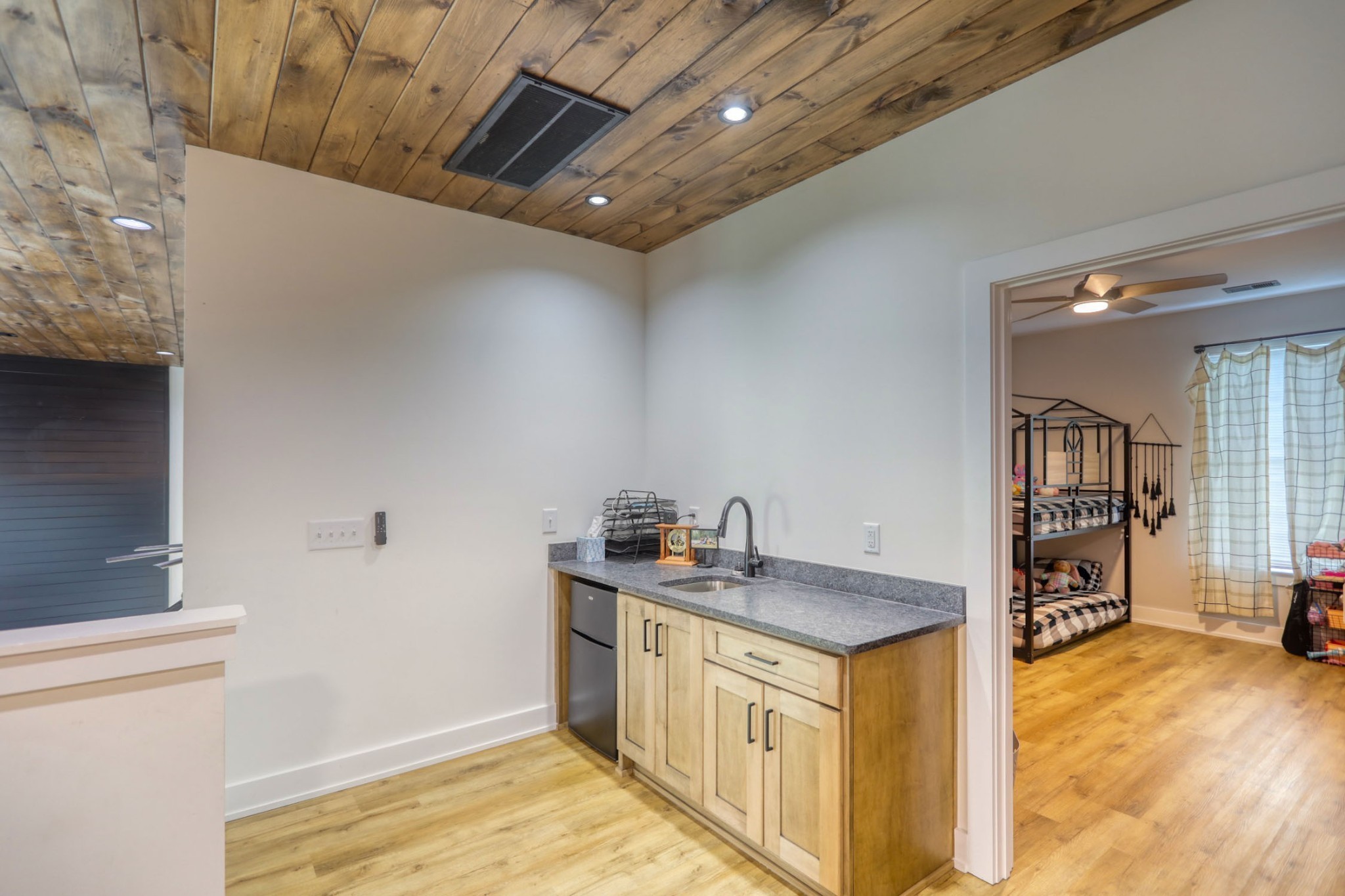 290 Dink Rut Road Portland, TN 37148 - Photo 33 of 56 a kitchen with stainless steel appliances granite countertop a sink stove and refrigerator