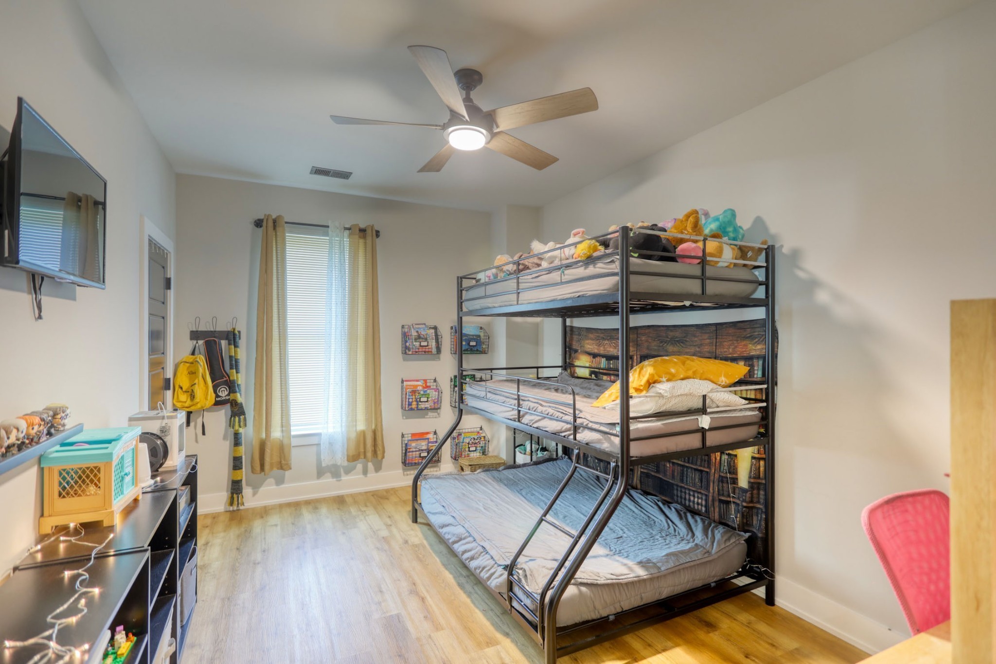 290 Dink Rut Road Portland, TN 37148 - Photo 36 of 56 a living room with furniture and a flat screen tv