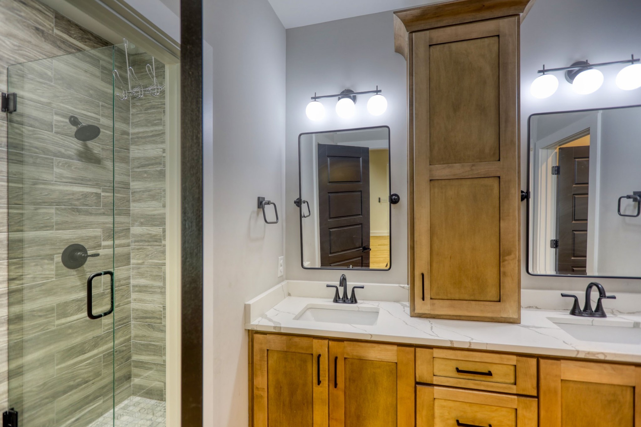 290 Dink Rut Road Portland, TN 37148 - Photo 38 of 56 a bathroom with a granite countertop sink vanity and mirror