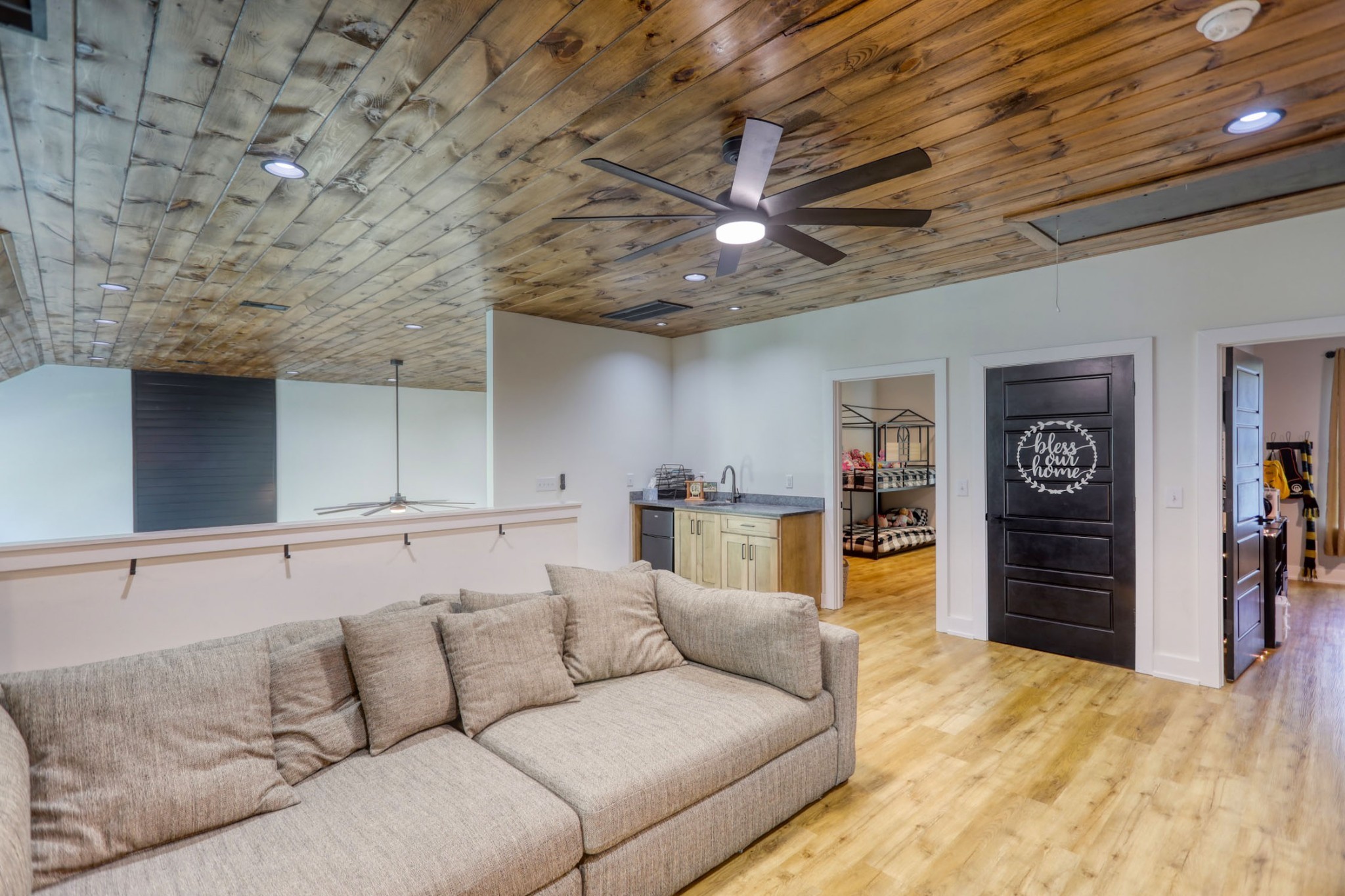 290 Dink Rut Road Portland, TN 37148 - Photo 45 of 56 a living room with furniture and a flat screen tv