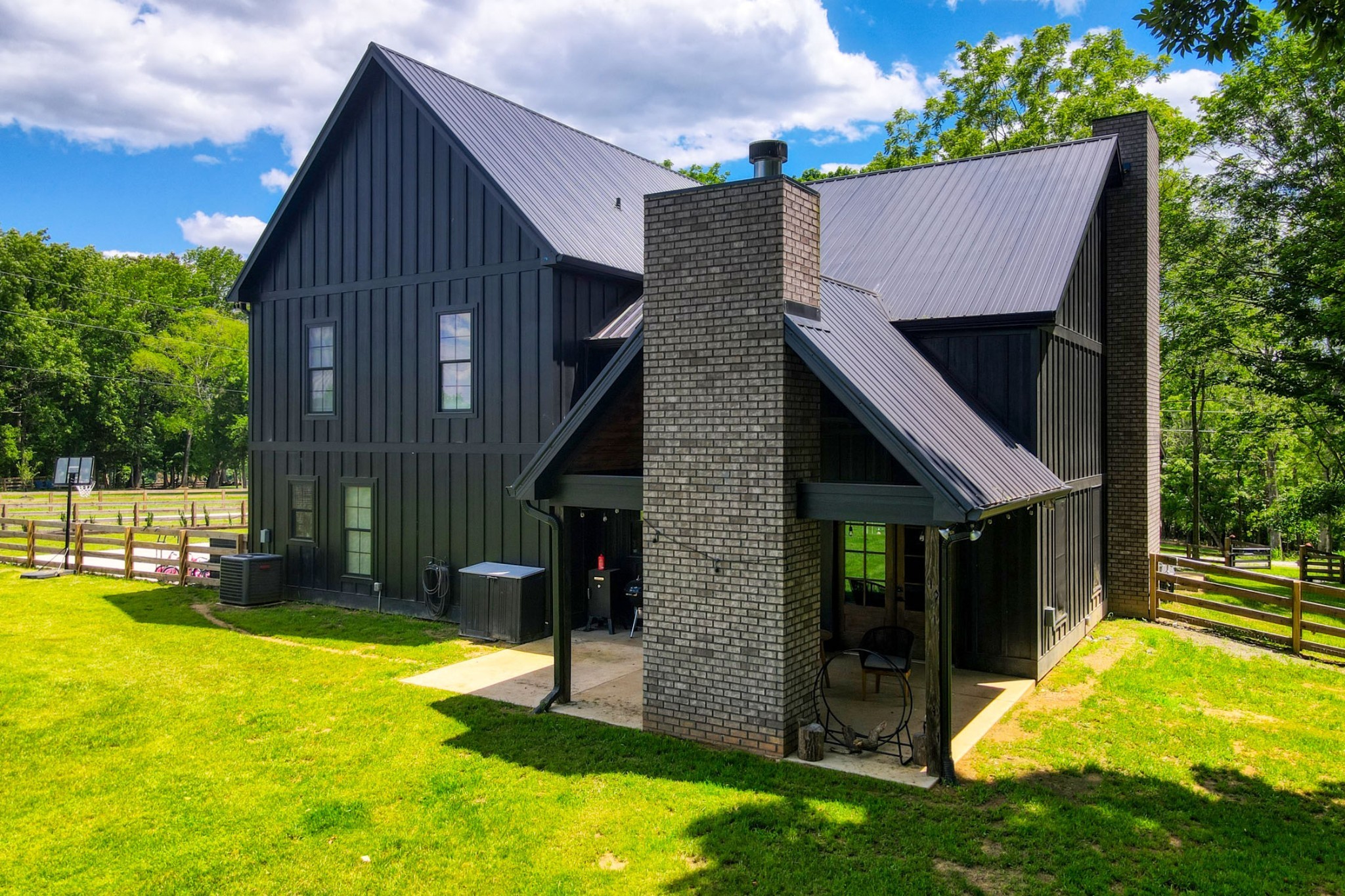 290 Dink Rut Road Portland, TN 37148 - Photo 50 of 56 a view of a house with a yard and a large tree