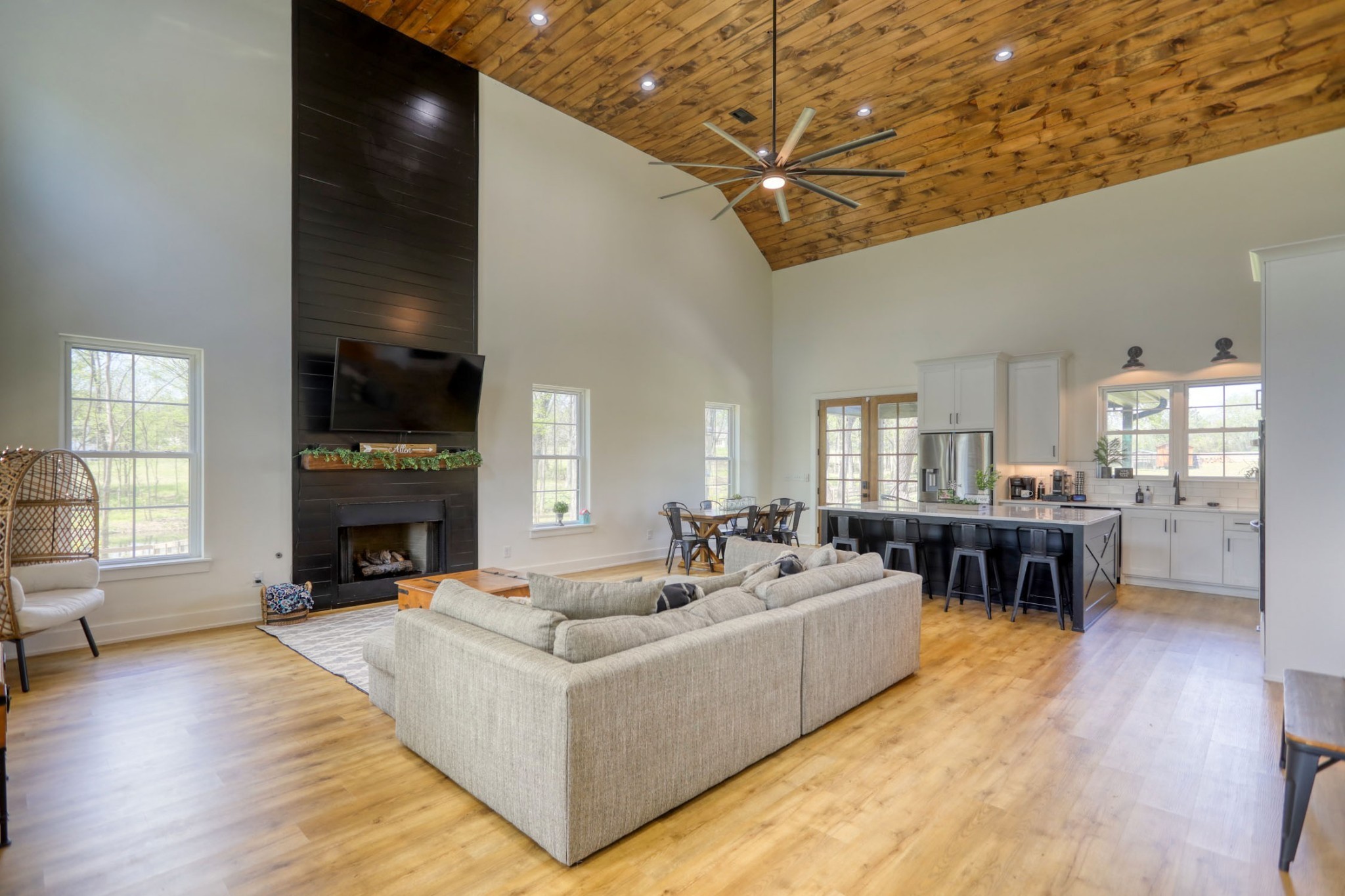 290 Dink Rut Road Portland, TN 37148 - Photo 5 of 56 a living room with furniture a fireplace a flat screen tv and windows