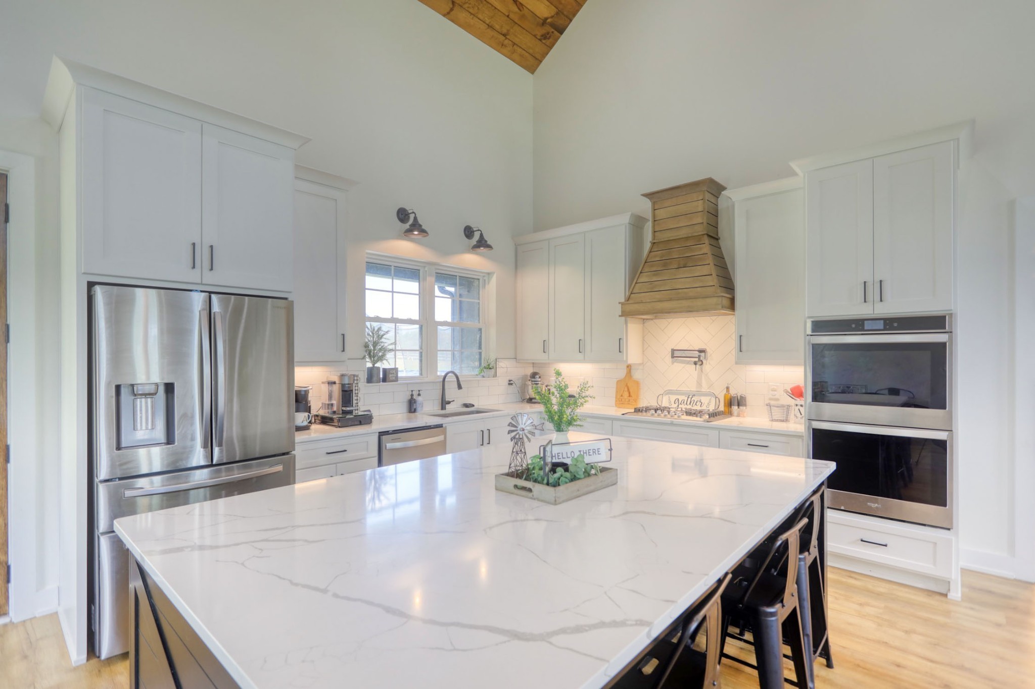 290 Dink Rut Road Portland, TN 37148 - Photo 8 of 56 a kitchen with granite countertop a sink a stove and refrigerator