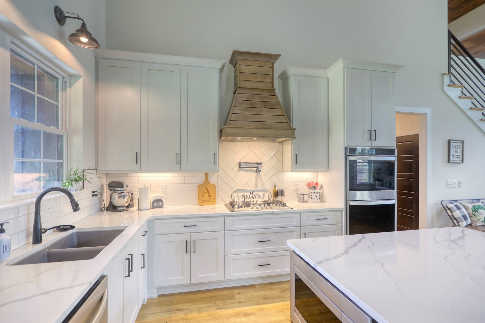 290 Dink Rut Road Portland, TN 37148 - Photo 9 of 56 a kitchen with kitchen island a sink appliances and cabinets