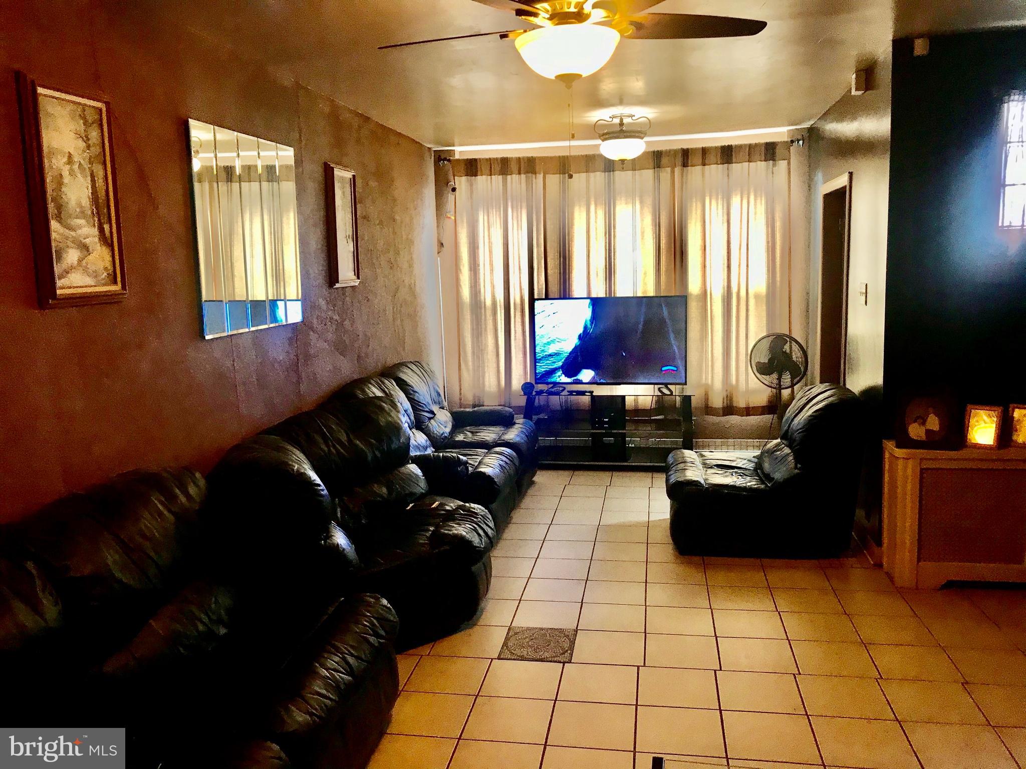 4736 Rorer Street Philadelphia, PA 19120 - Photo 2 of 13 LIVING ROOM 1