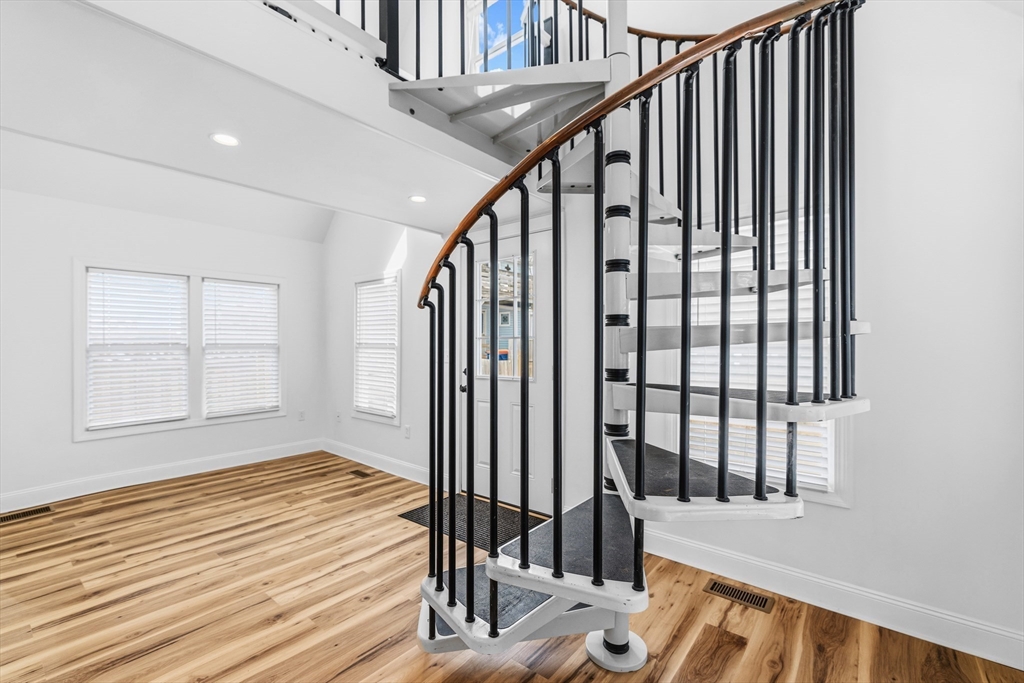 8 Cottage Street Wareham, MA 02571 - Photo 17 of 30 a view of an entryway with wooden floor and door