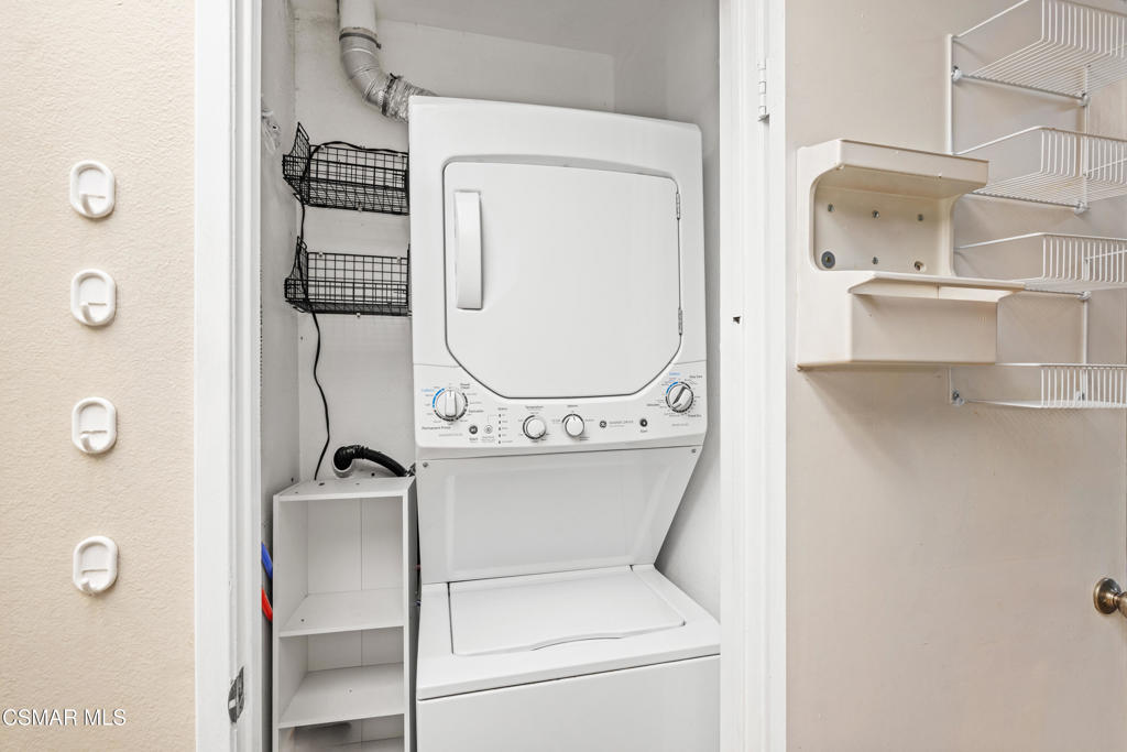 3354 Darby Street, Unit 313 Simi Valley, CA 93063 - Photo 15 of 30 a utility room with dryer and washer