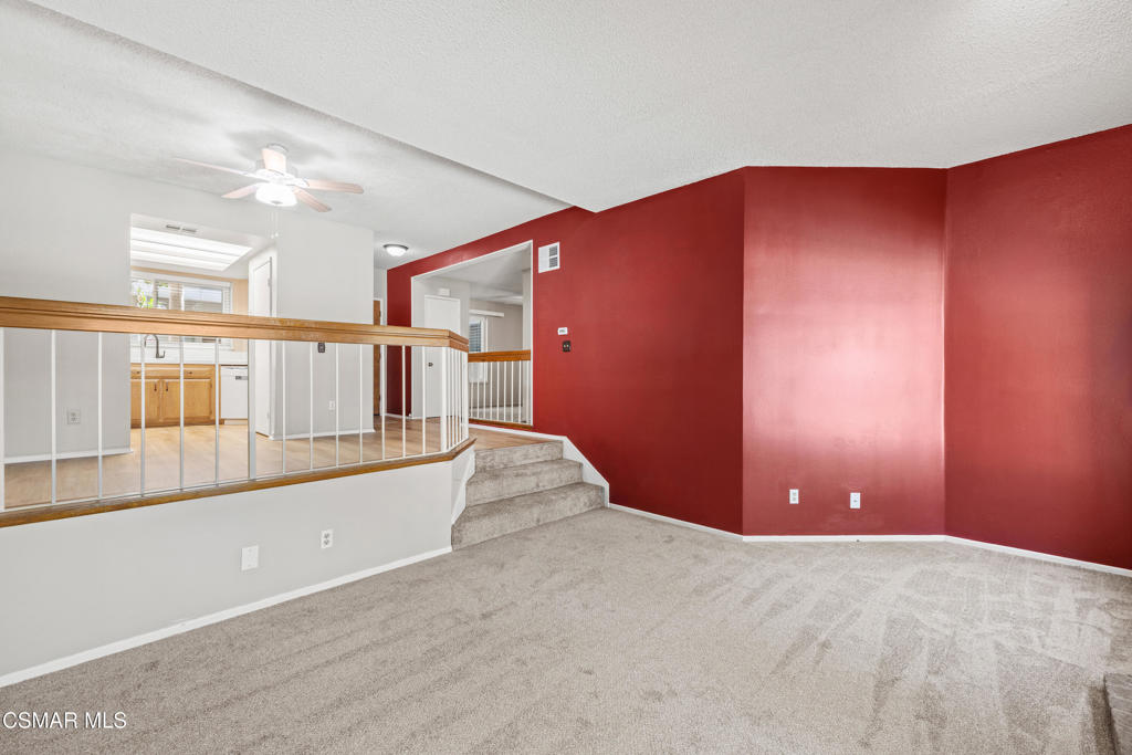 3354 Darby Street, Unit 313 Simi Valley, CA 93063 - Photo 19 of 30 a view of a living room with kitchen