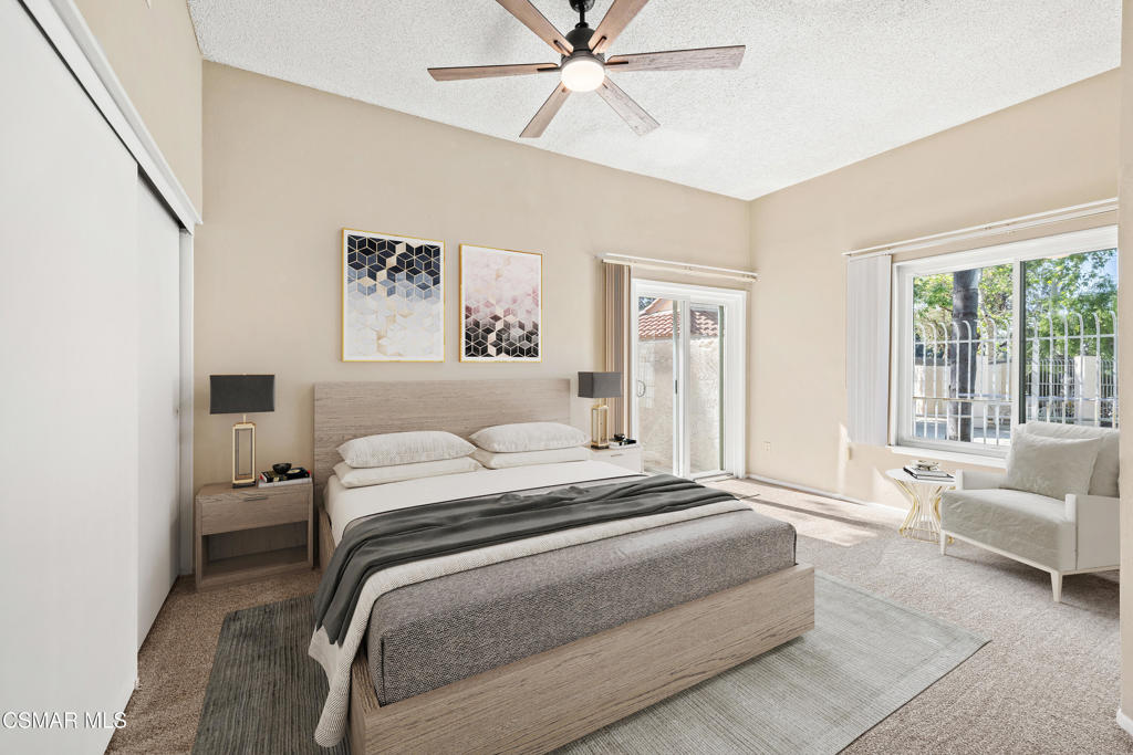3354 Darby Street, Unit 313 Simi Valley, CA 93063 - Photo 23 of 30 a spacious bedroom with a bed and a couch