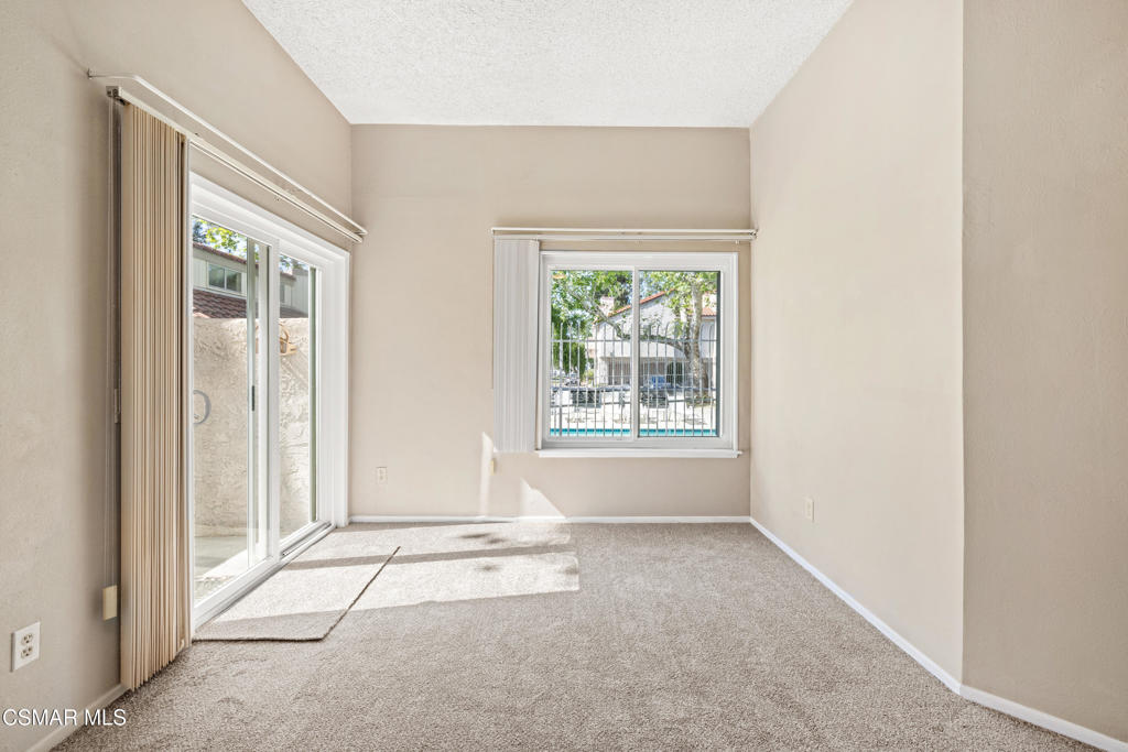 3354 Darby Street, Unit 313 Simi Valley, CA 93063 - Photo 24 of 30 an empty room with windows