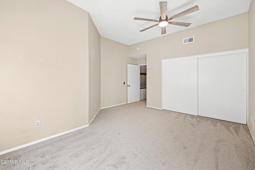 3354 Darby Street, Unit 313 Simi Valley, CA 93063 - Photo 26 of 30 an empty room with a ceiling fan and a fan