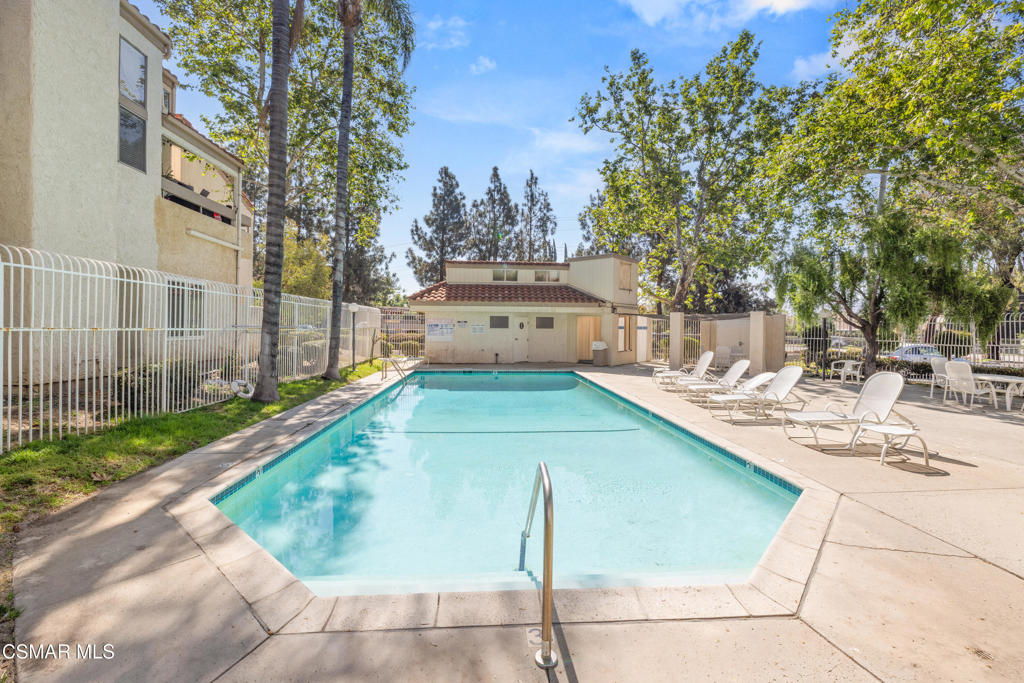 3354 Darby Street, Unit 313 Simi Valley, CA 93063 - Photo 29 of 30 a view of a swimming pool with a patio