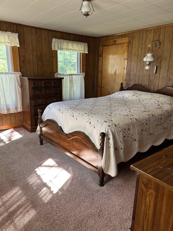 1386 Pleasant Street Athol, MA 01331 - Photo 7 of 11 a bedroom with a bed and window