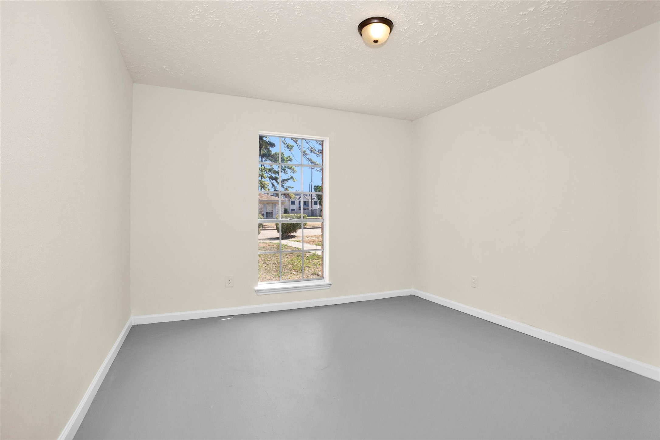 2126 Millhouse Road Houston, TX 77073 - Photo 26 of 30 an empty room with a window