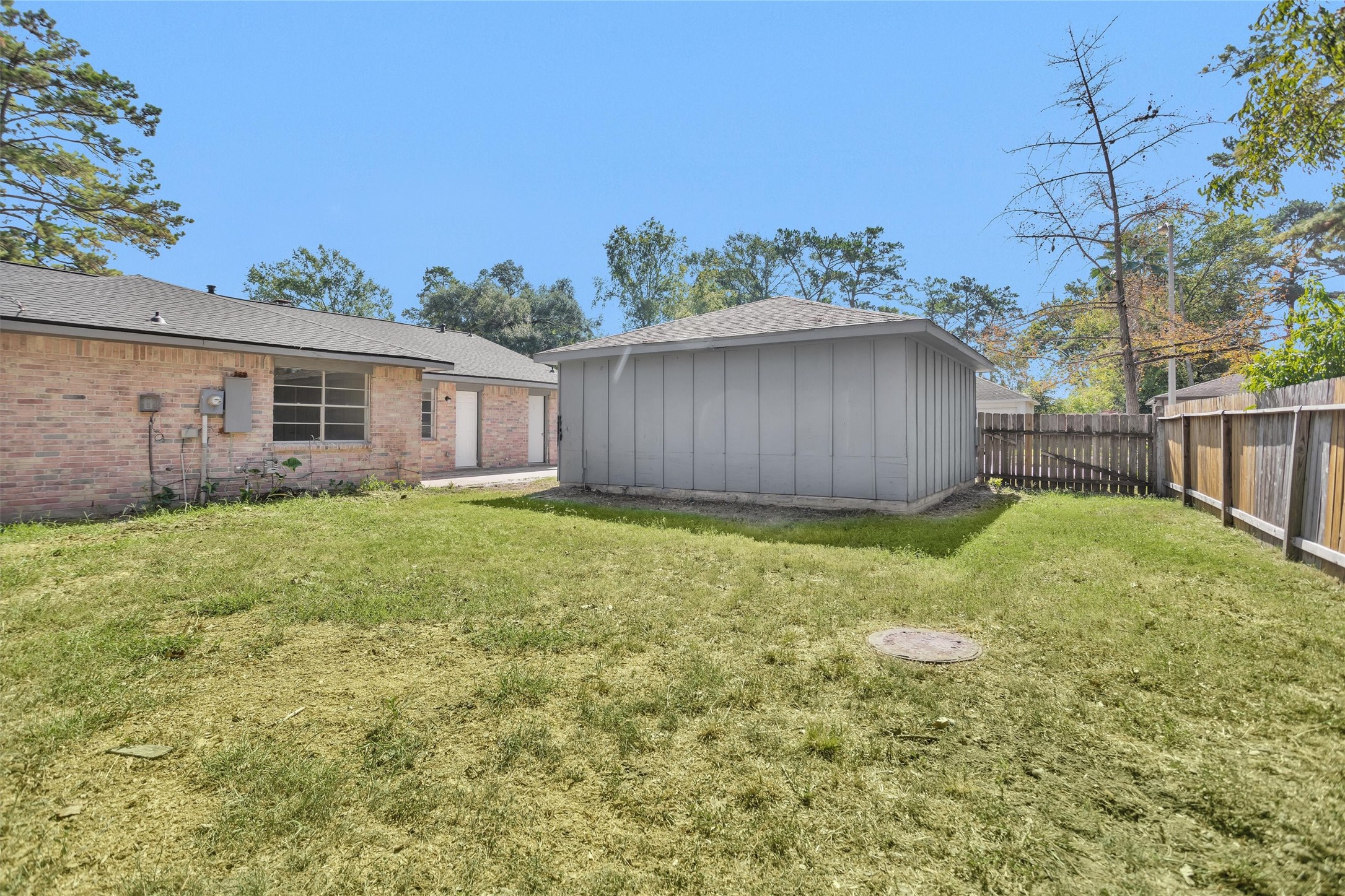 2126 Millhouse Road Houston, TX 77073 - Photo 30 of 30 a view of a backyard with a garden