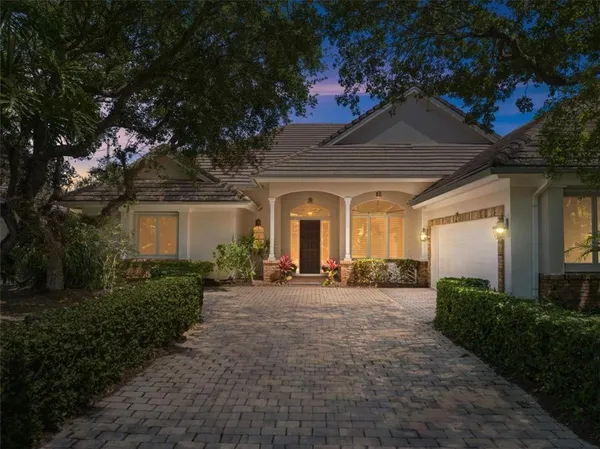 a view of a house with outdoor space and porch