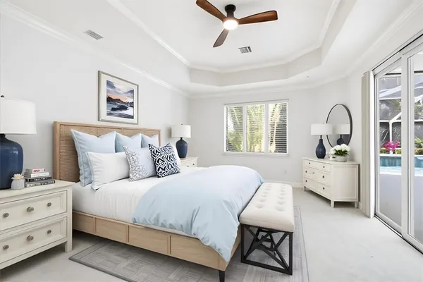 a bedroom with bed and window