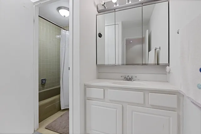 a large white building with glass windows