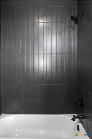 a bathroom with a bathtub