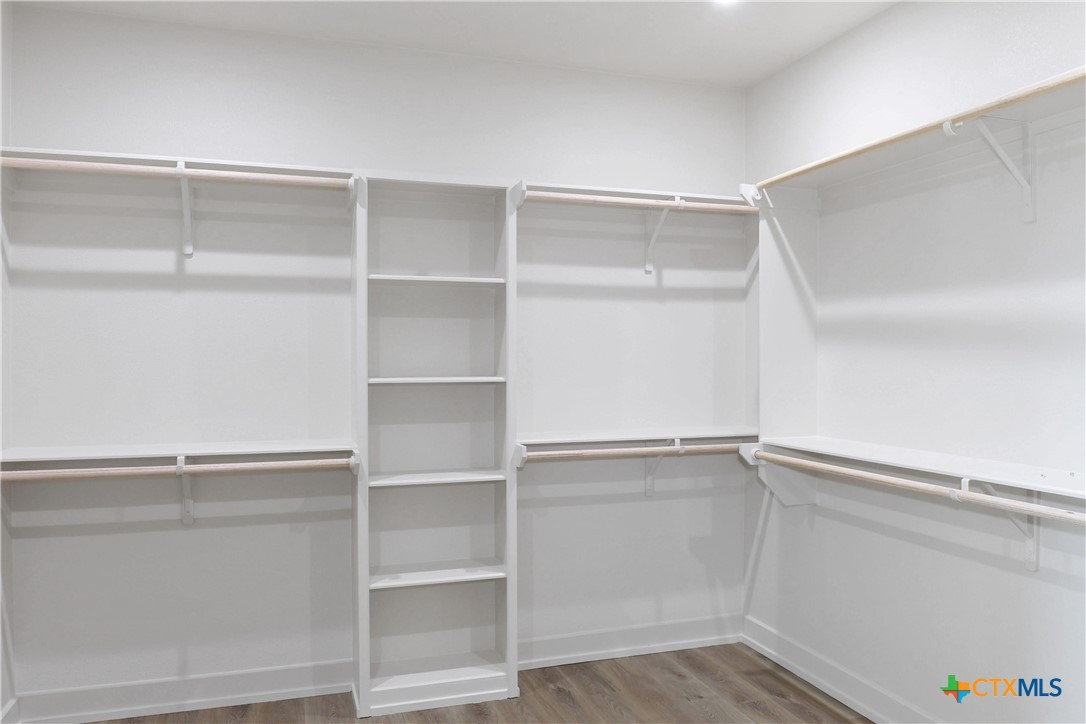 16026 Honey Ridge Drive Holland, TX 76534 - Photo 25 of 27 a view of an empty walk in closet