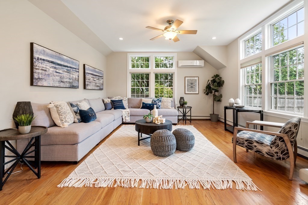 41 Janet Road Newton, MA 02459 - Photo 18 of 37 a living room with furniture fireplace and a large window