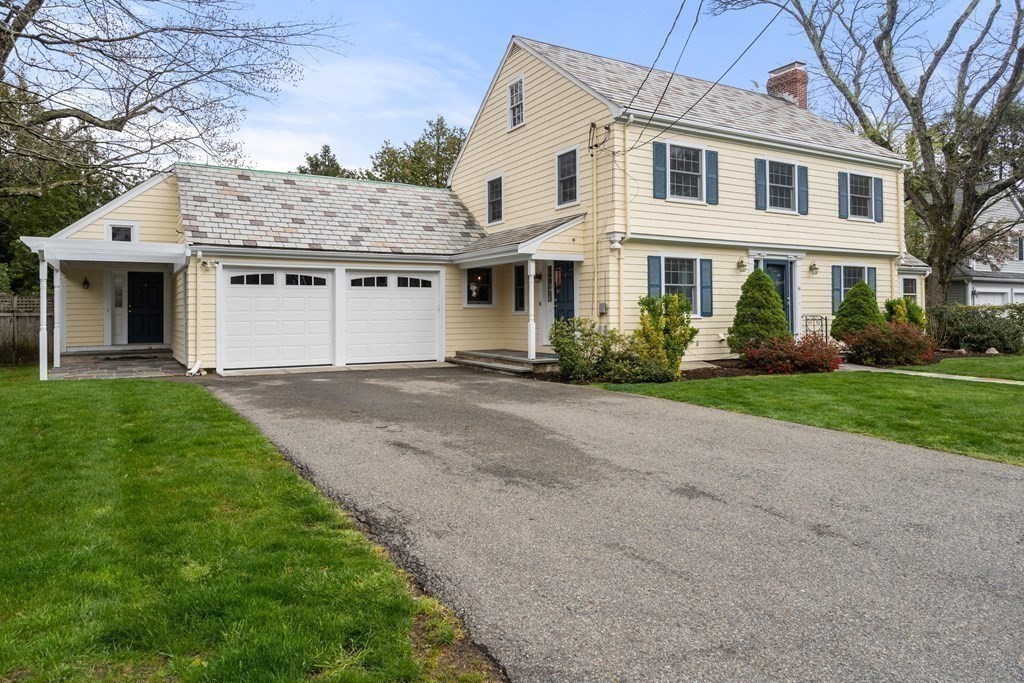 41 Janet Road Newton, MA 02459 - Photo 35 of 37 a front view of a house with a garden