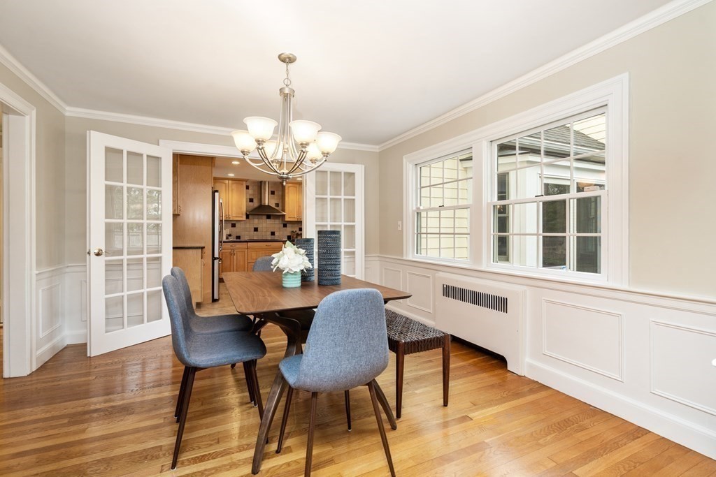 41 Janet Road Newton, MA 02459 - Photo 10 of 37 a view of a dining room with furniture and wooden floor