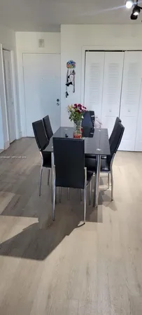 a view of a workspace with furniture