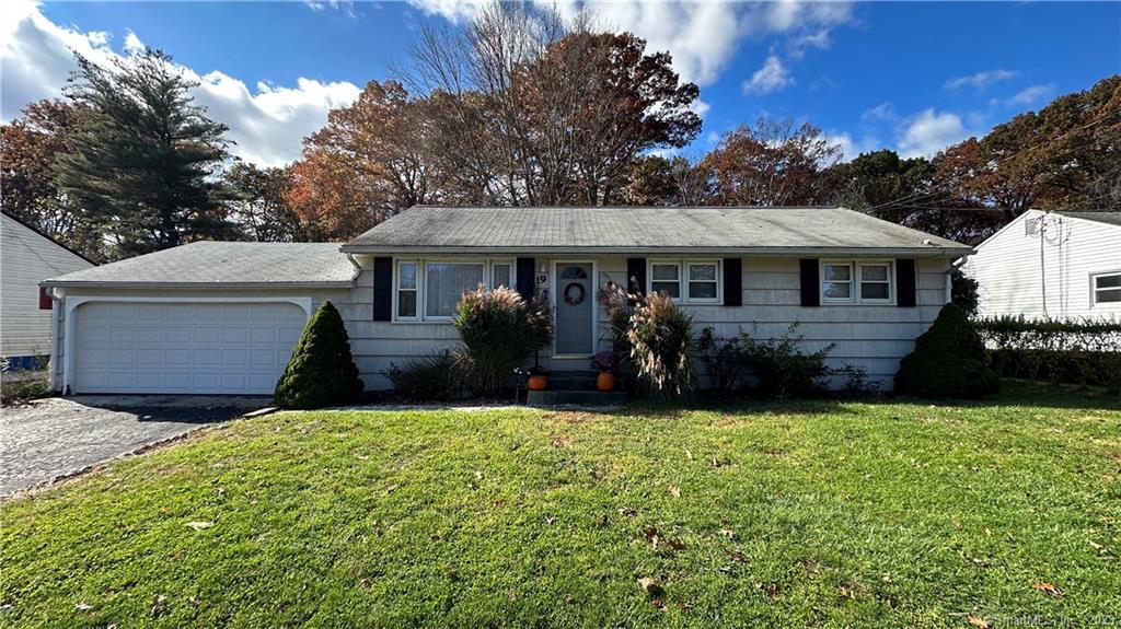 19 Beech Road Enfield, CT 06082 - Photo 1 of 1 a view of a house with a yard and potted plants