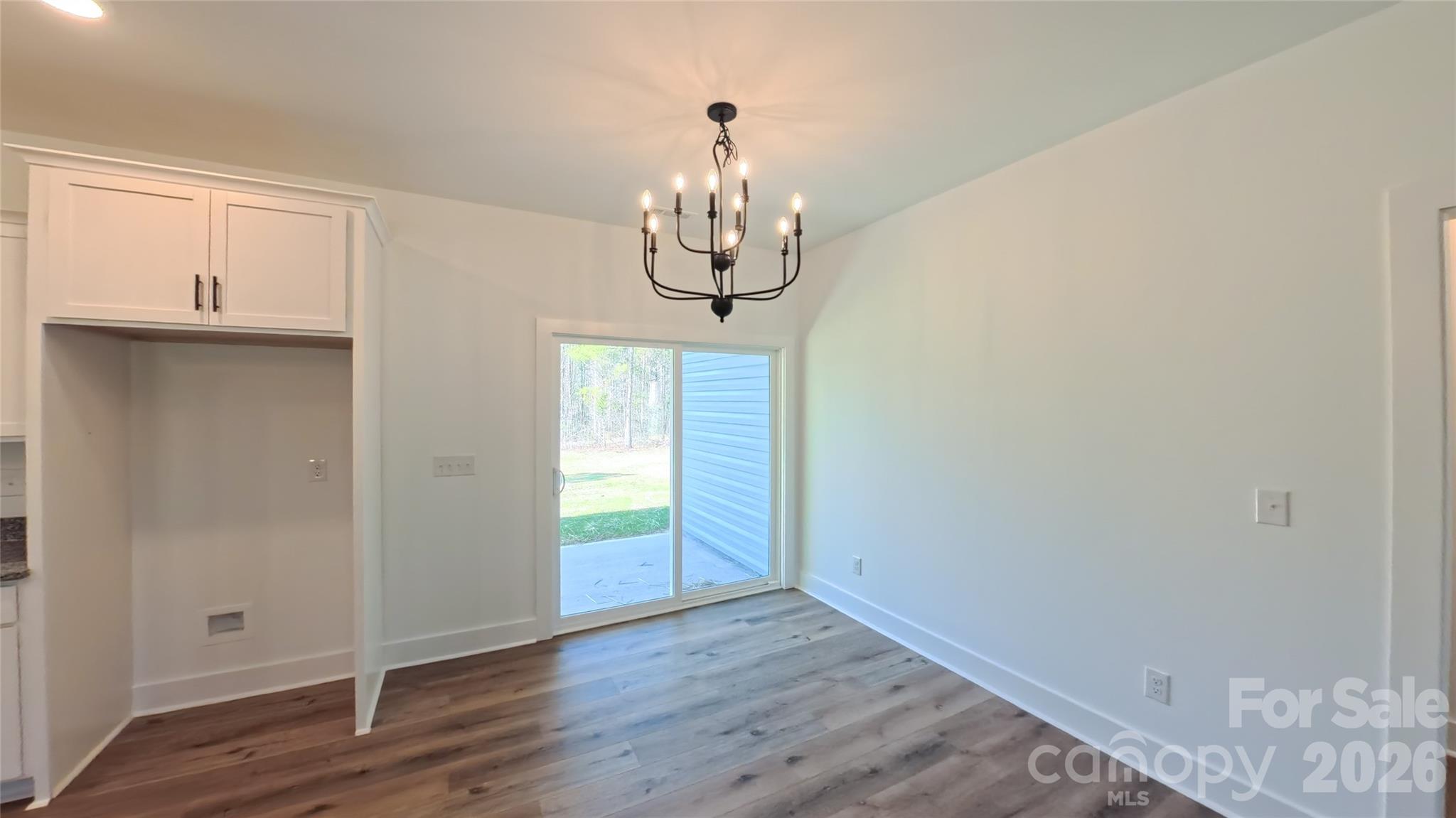 4018 Deerstone Lane Clover, SC 29710 - Photo 11 of 35 a view of a room with wooden floor and staircase