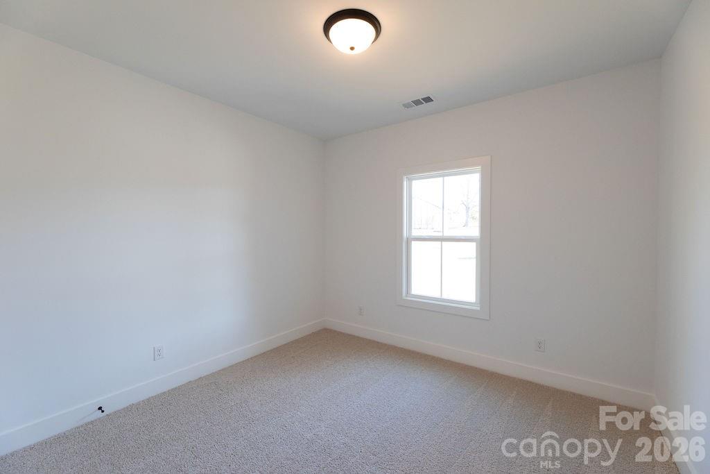 4018 Deerstone Lane Clover, SC 29710 - Photo 22 of 35 an empty room with a window