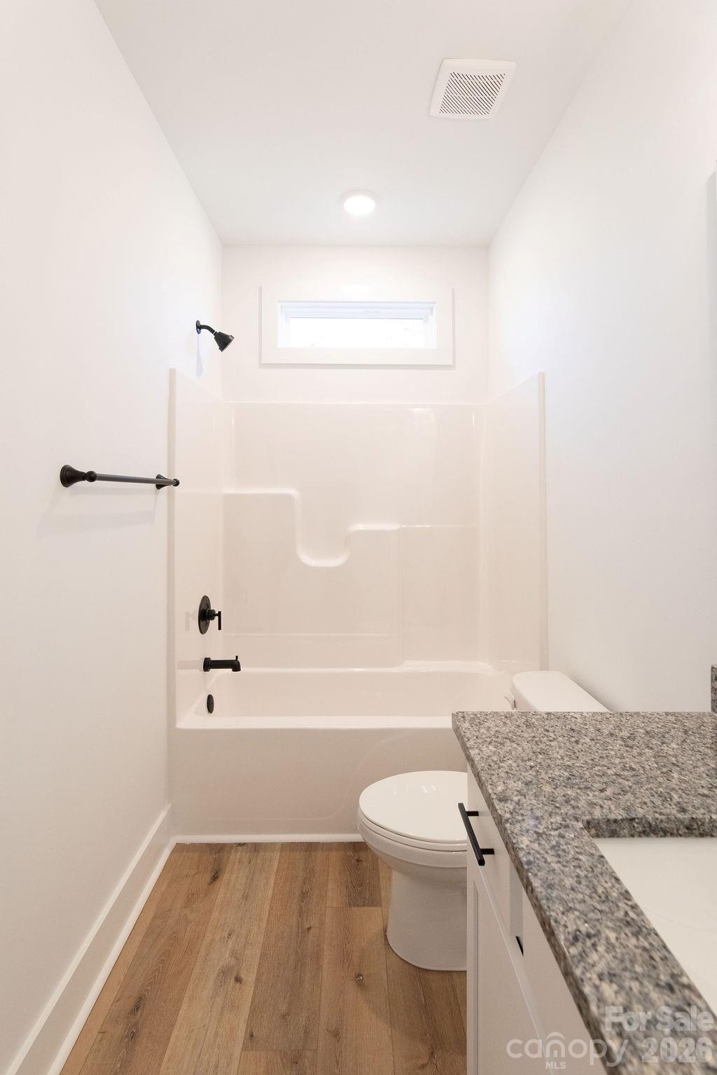 4018 Deerstone Lane Clover, SC 29710 - Photo 27 of 35 a bathroom with a granite countertop bathtub shower sink and toilet