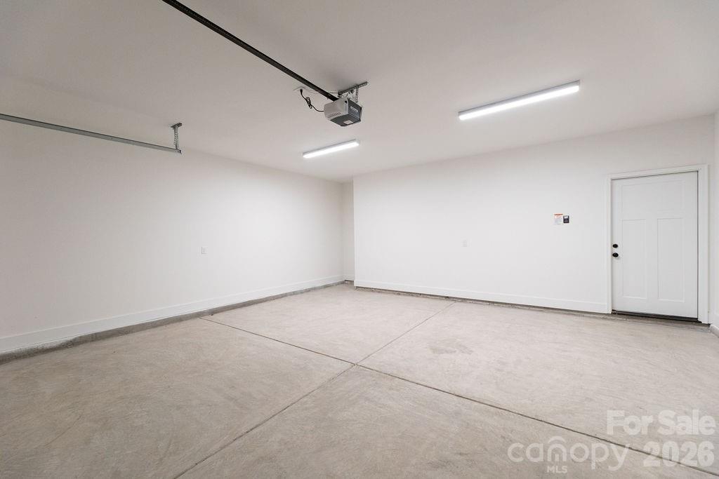 4018 Deerstone Lane Clover, SC 29710 - Photo 34 of 35 an empty room with ceiling fan and windows