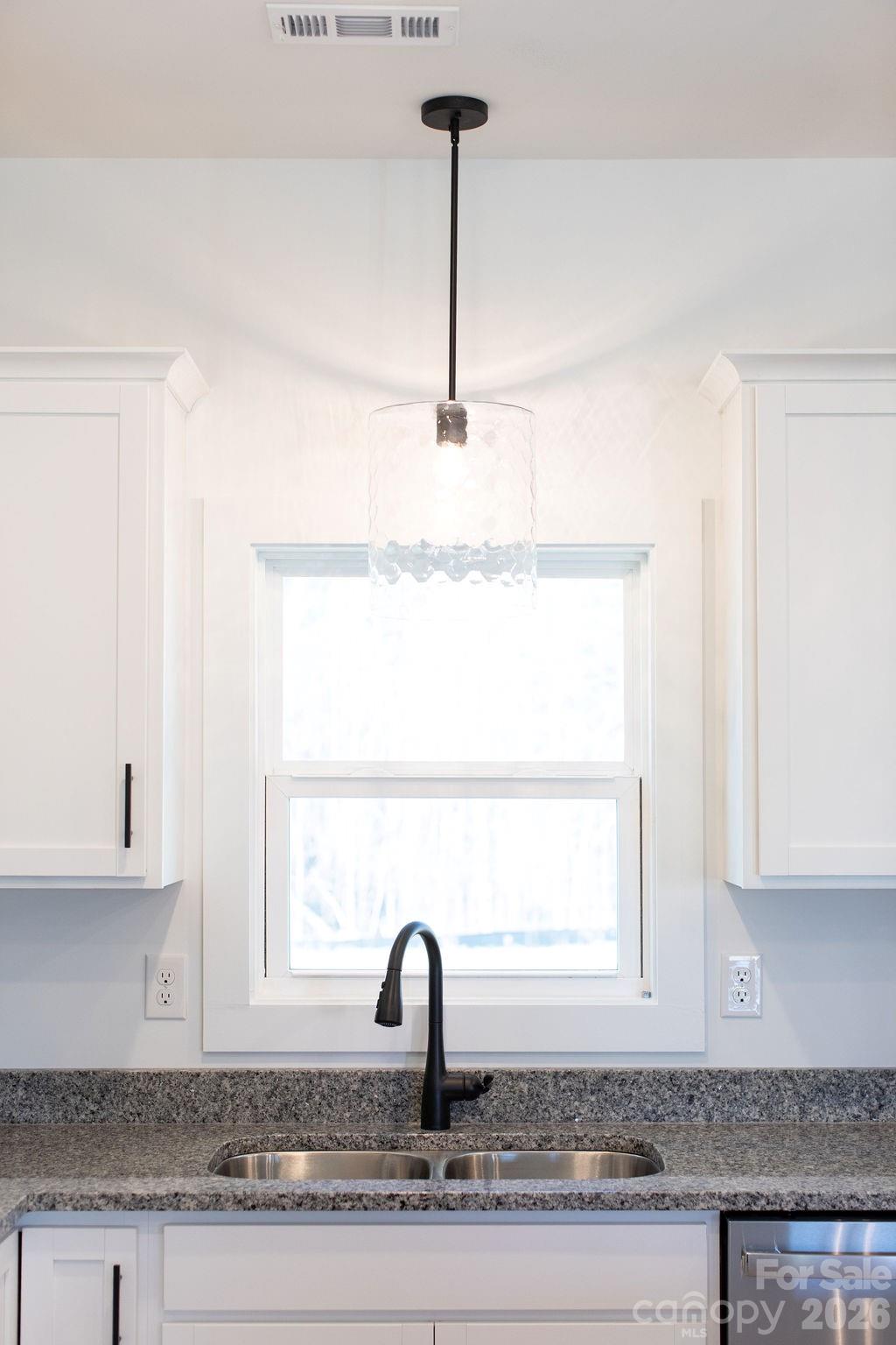 4018 Deerstone Lane Clover, SC 29710 - Photo 10 of 35 a kitchen with a sink and a window