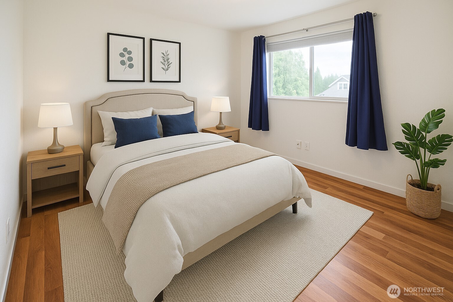 16604 3rd Avenue Southeast Bothell, WA 98012 - Photo 15 of 22 a bedroom with a large bed and a potted plant